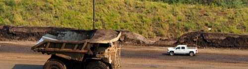 Heavy mining equipment on a mine haul road