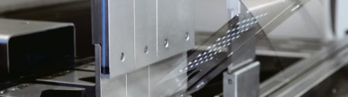 Close-up of custom sheet metal bending fabrication